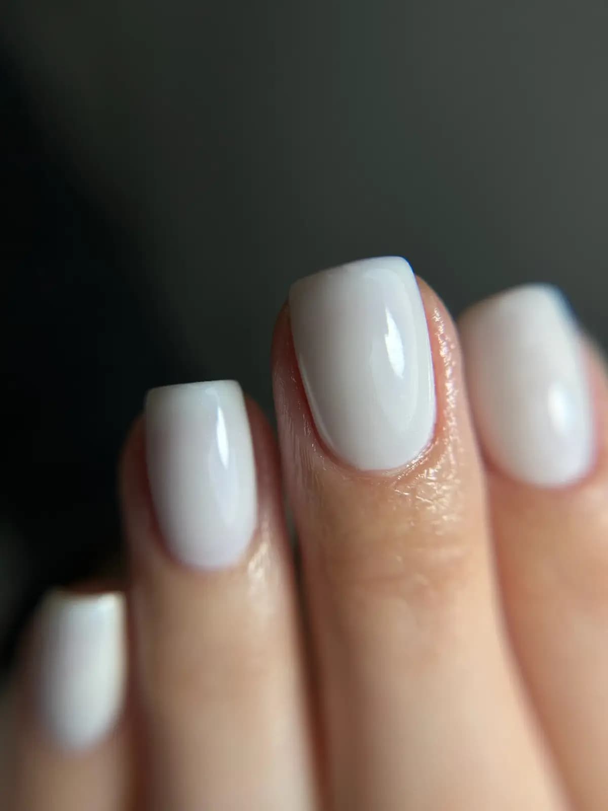 Square nails in pure white gel, medium length with an even shine