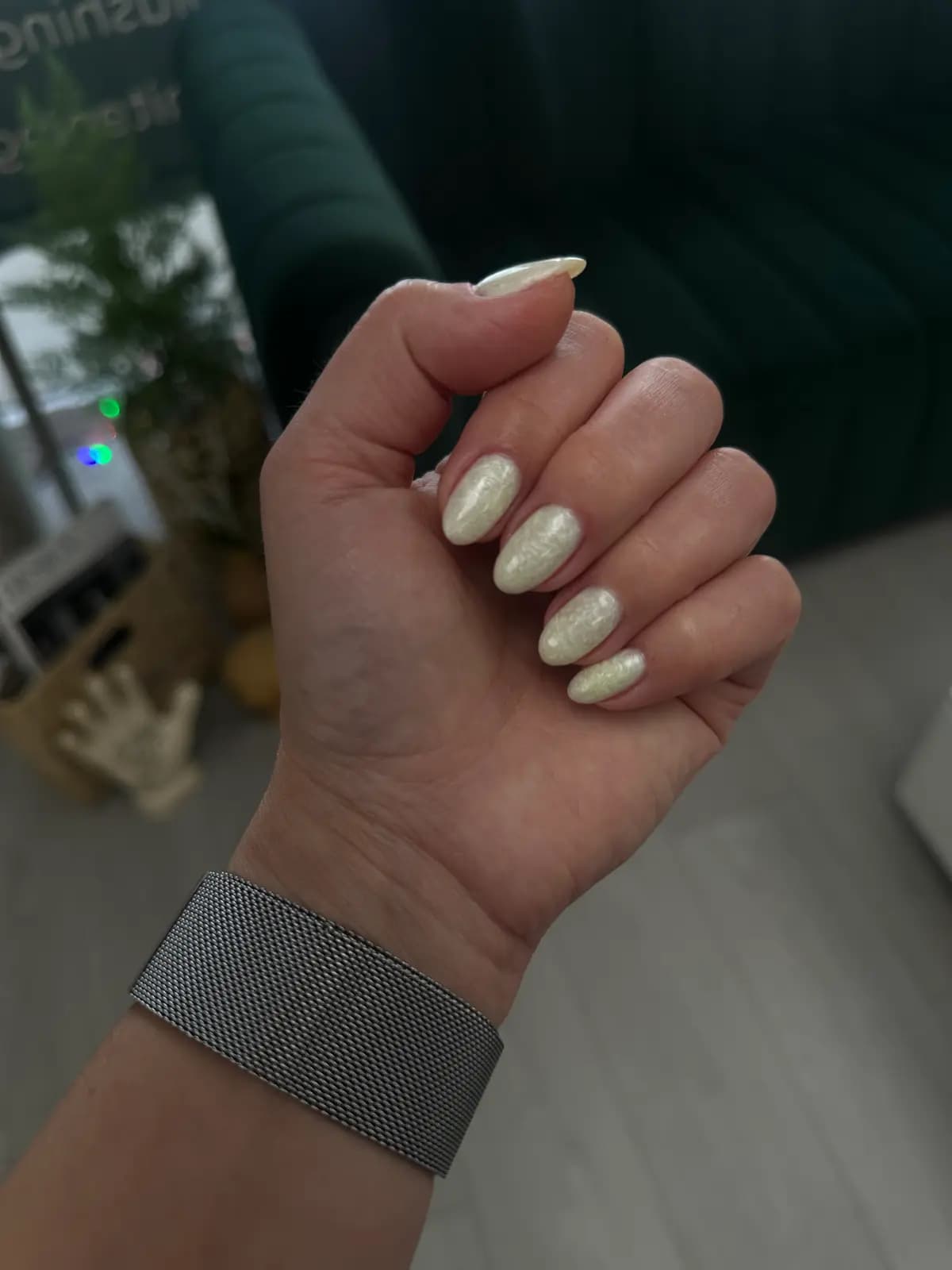 Short almond nails in pearl white gel with a soft shine